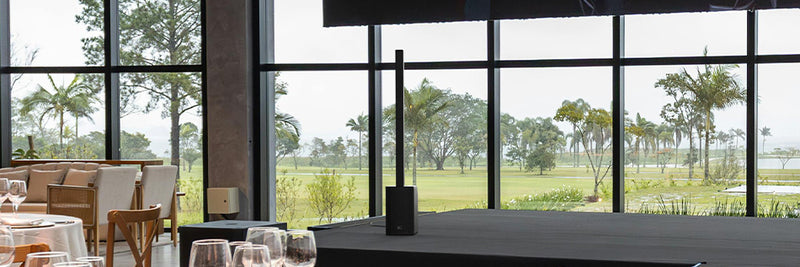 Modern interior with large windows overlooking a scenic landscape