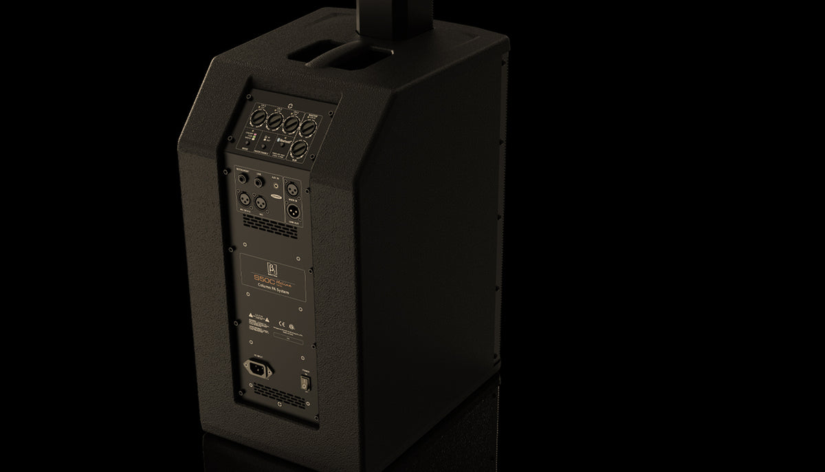 Black audio equipment with control panels on a black background
