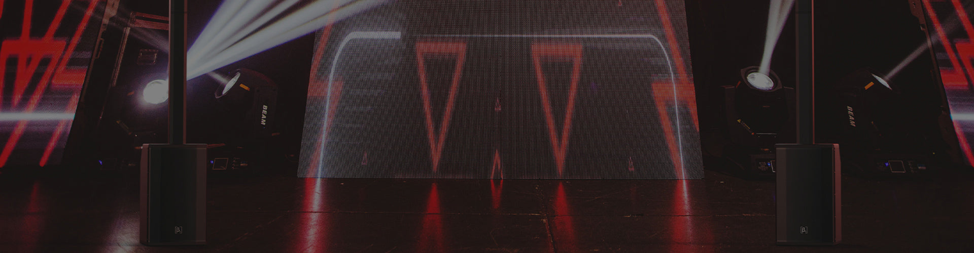 Modern stage with red accents and geometric design elements.
